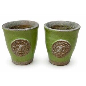 Two ceramic green pots